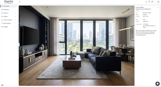 A modern luxury apartment interior in soft natural daylight, with dark navy fabrics and polished wood.
